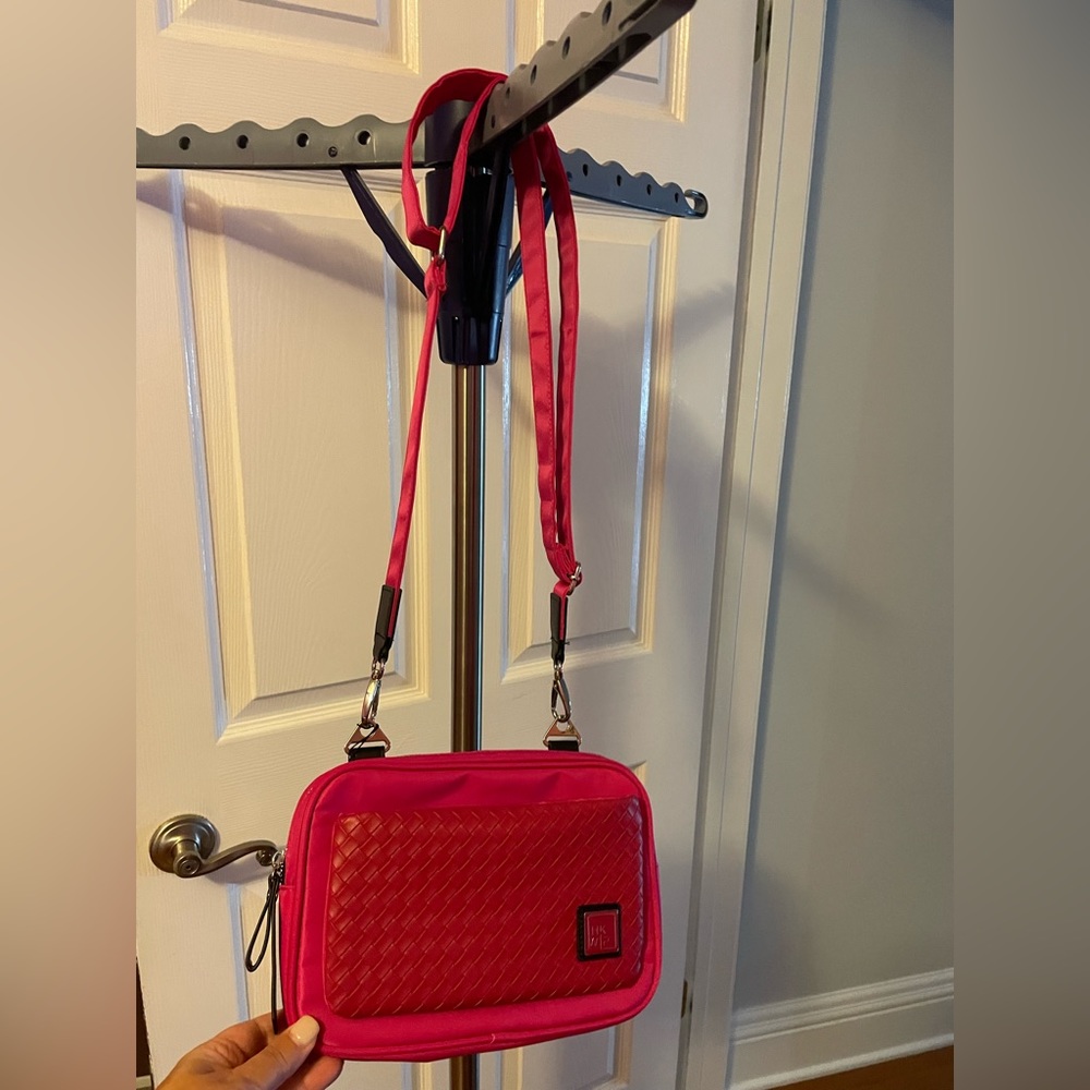 Ihkwip the woven front pocket crossbody. Ruby Berry. NWT. Smoke free home.